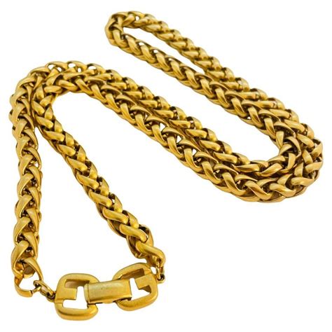 givenchy gold earrings vintage|vintage givenchy gold chain necklace.